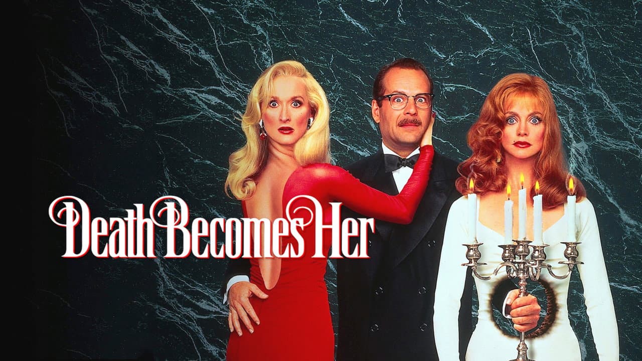 Death Becomes Her — backdrops with title 3